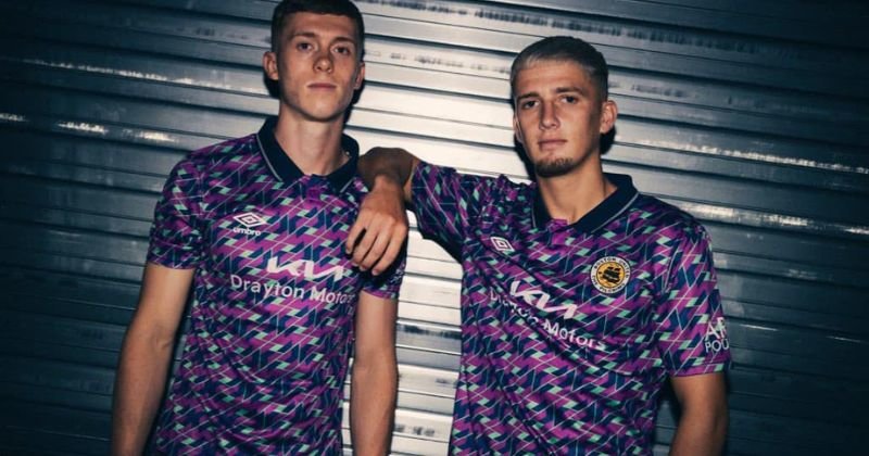 players wearing boston united 2023-24 away shirt in purple